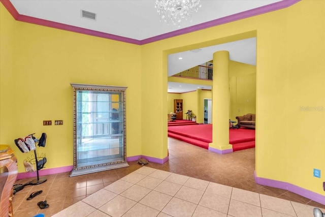 4105 37th St E, Bradenton, FL 34208 - entryway featuring tile patterned flooring and a chandelier