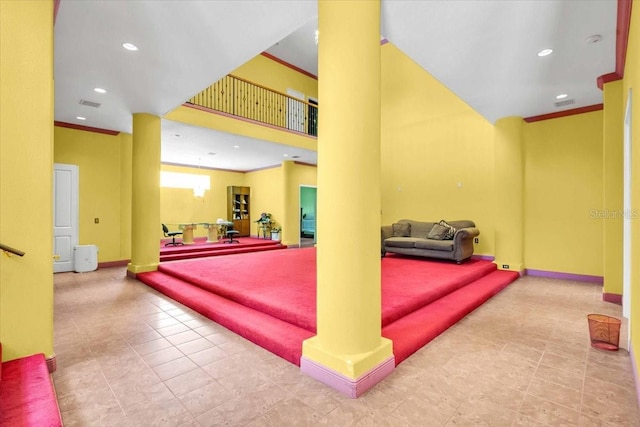 4105 37th St E, Bradenton, FL 34208 - miscellaneous room featuring recessed lighting, tile patterned floors, ornamental molding, and a towering ceiling