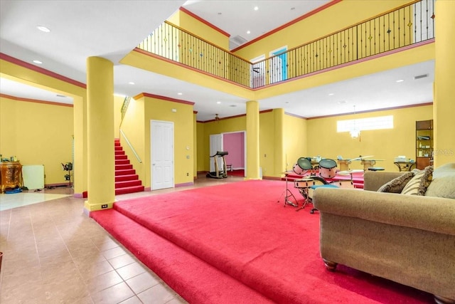 4105 37th St E, Bradenton, FL 34208 - tiled living room with ornamental molding, recessed lighting, and stairs