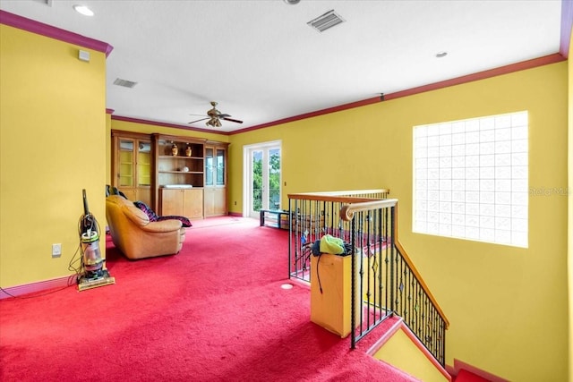 4105 37th St E, Bradenton, FL 34208 - sitting room with an upstairs landing, carpet floors, ceiling fan, and ornamental molding