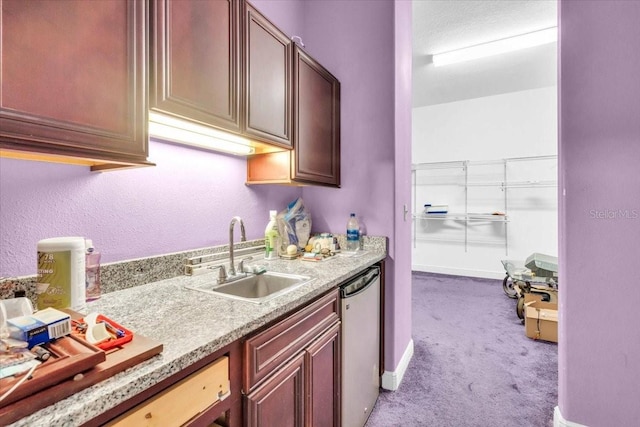 4105 37th St E, Bradenton, FL 34208 - kitchen with light carpet and stainless steel dishwasher