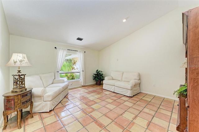 3217 Oak Grove Dr, Sarasota, FL 34243 - living area featuring lofted ceiling and light tile patterned floors