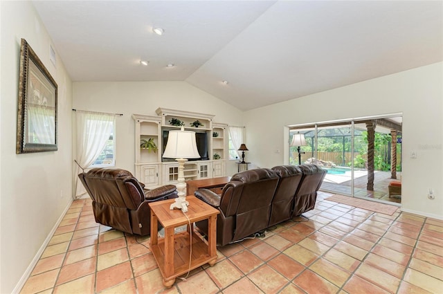 3217 Oak Grove Dr, Sarasota, FL 34243 - living area with vaulted ceiling and plenty of natural light