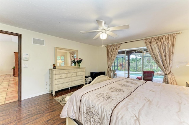 3217 Oak Grove Dr, Sarasota, FL 34243 - bedroom with access to exterior, wood finished floors, a sunroom, and a ceiling fan