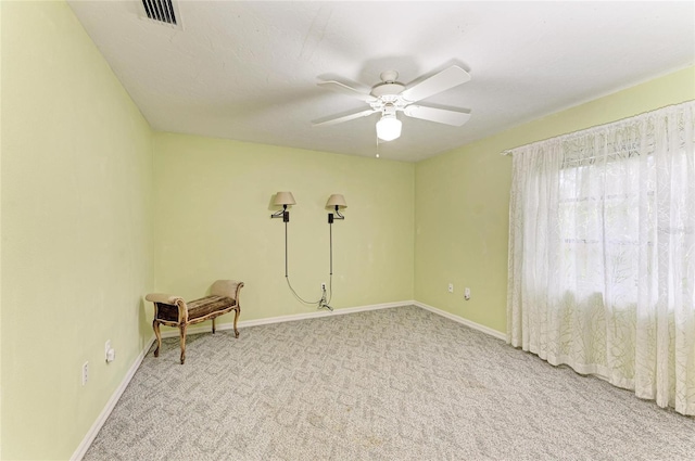 3217 Oak Grove Dr, Sarasota, FL 34243 - unfurnished room with ceiling fan and carpet floors