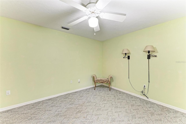 3217 Oak Grove Dr, Sarasota, FL 34243 - empty room with carpet floors and a ceiling fan