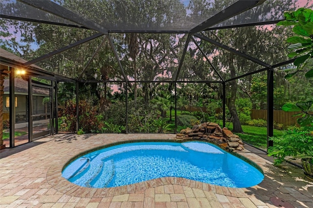 3217 Oak Grove Dr, Sarasota, FL 34243 - view of swimming pool featuring a patio area and glass enclosure