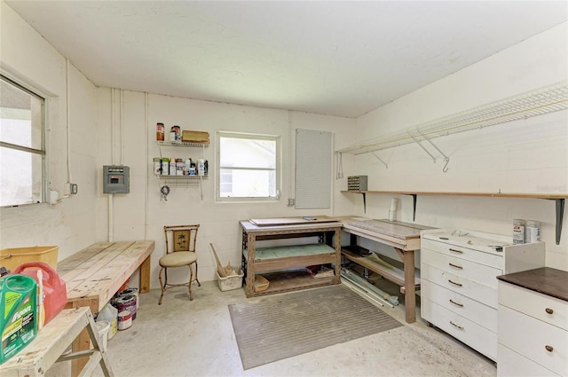 3217 Oak Grove Dr, Sarasota, FL 34243 - interior space featuring a workshop area and unfinished concrete flooring