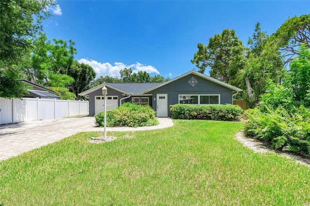 5415 13th Avenue Dr W, Bradenton, FL 34209 - ranch-style home with driveway and a garage