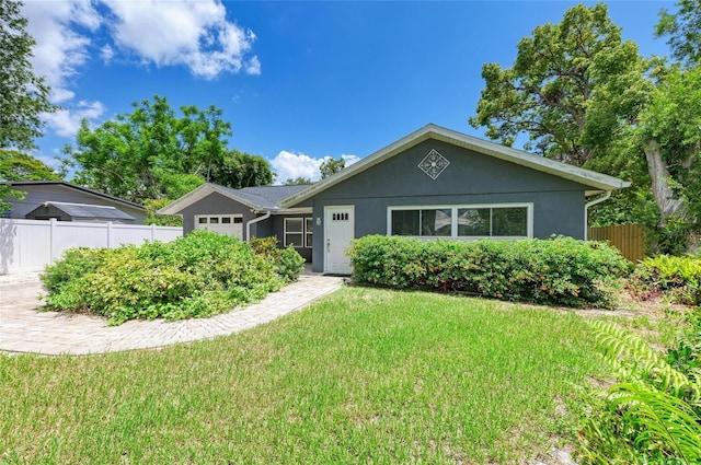 5415 13th Avenue Dr W, Bradenton, FL 34209 - ranch-style home with an attached garage and stucco siding