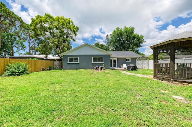 5415 13th Avenue Dr W, Bradenton, FL 34209 - back of property featuring a fenced backyard and a gazebo