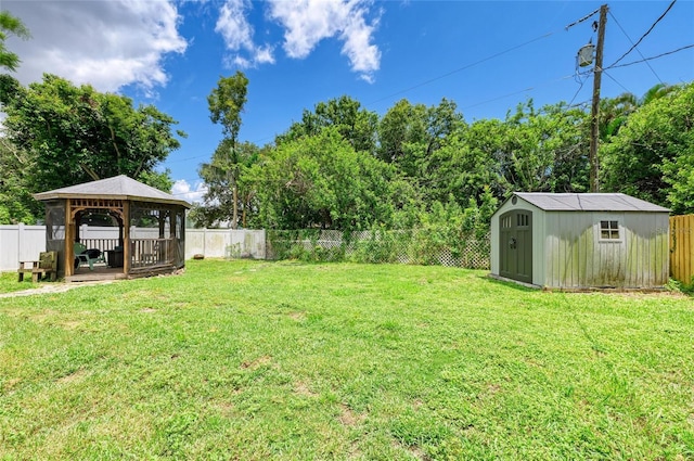 5415 13th Avenue Dr W, Bradenton, FL 34209 - fenced backyard featuring a gazebo and a storage shed