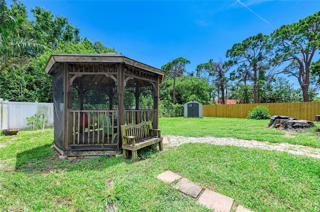 5415 13th Avenue Dr W, Bradenton, FL 34209 - fenced backyard with a gazebo and a storage shed