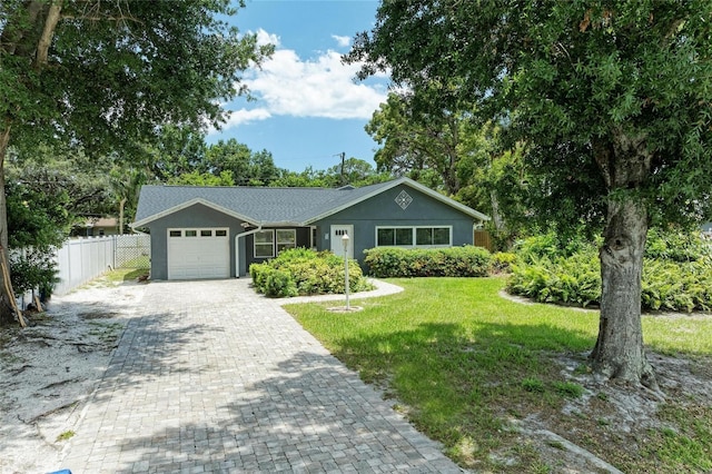 5415 13th Avenue Dr W, Bradenton, FL 34209 - single story home featuring an attached garage, decorative driveway, and stucco siding