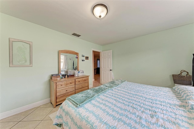2406 15th St W, Palmetto, FL 34221 - bedroom featuring light tile patterned flooring and baseboards