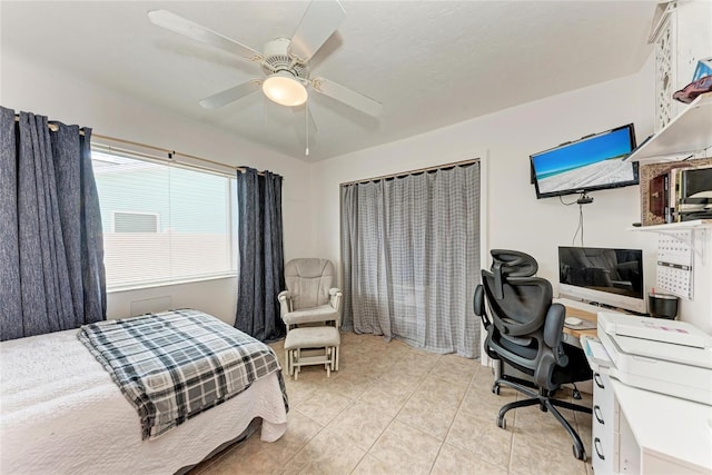 2406 15th St W, Palmetto, FL 34221 - bedroom with a desk, light tile patterned floors, and ceiling fan