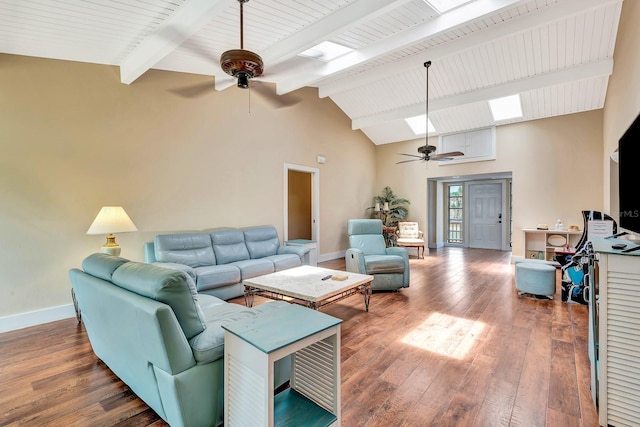 2315 Riverwood Pines Dr, Sarasota, FL 34231 - living room with ceiling fan, hardwood / wood-style floors, beam ceiling, a skylight, and high vaulted ceiling