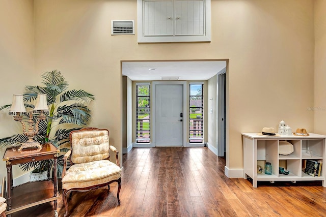 2315 Riverwood Pines Dr, Sarasota, FL 34231 - foyer entrance with hardwood / wood-style flooring and a towering ceiling