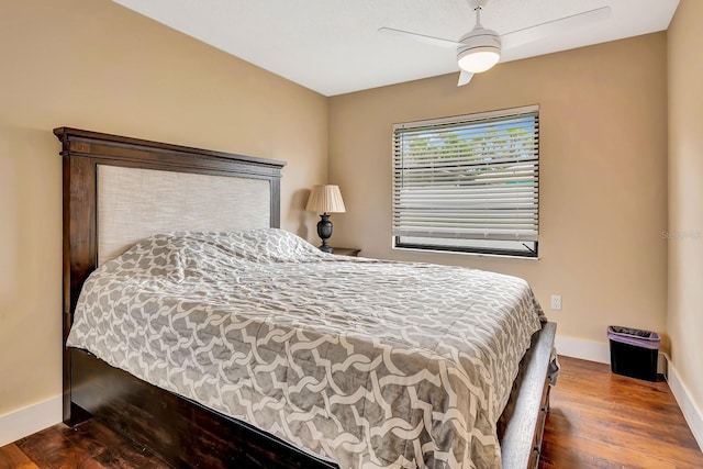 2315 Riverwood Pines Dr, Sarasota, FL 34231 - bedroom with wood finished floors and a ceiling fan