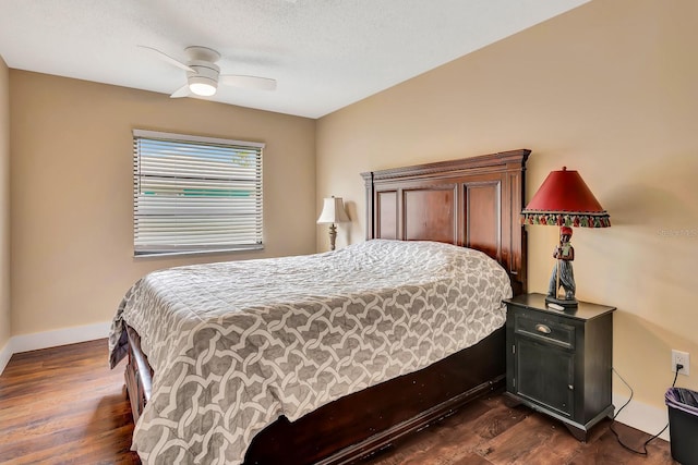 2315 Riverwood Pines Dr, Sarasota, FL 34231 - bedroom featuring dark wood-type flooring and ceiling fan