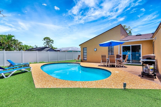 2315 Riverwood Pines Dr, Sarasota, FL 34231 - view of pool featuring grilling area, a fenced backyard, and a patio