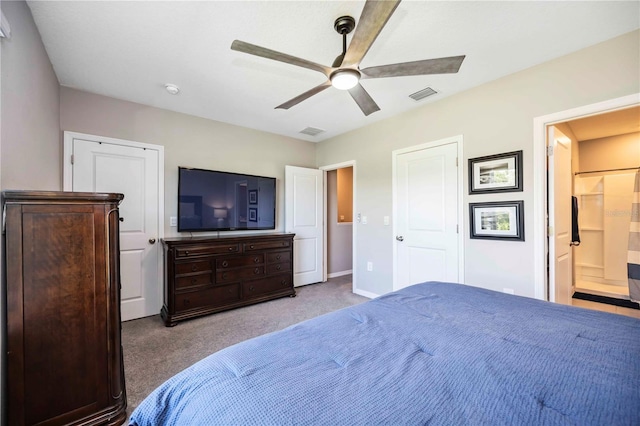 8979 Milestone Dr, Sarasota, FL 34238 - bedroom with carpet flooring, ceiling fan, ensuite bathroom, and a closet