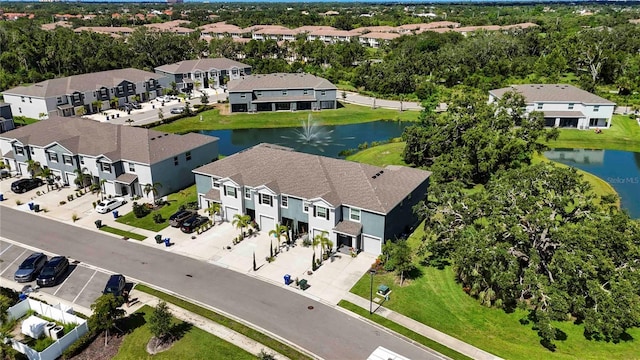 8979 Milestone Dr, Sarasota, FL 34238 - aerial view of residential area featuring a nearby body of water and a tree filled landscape