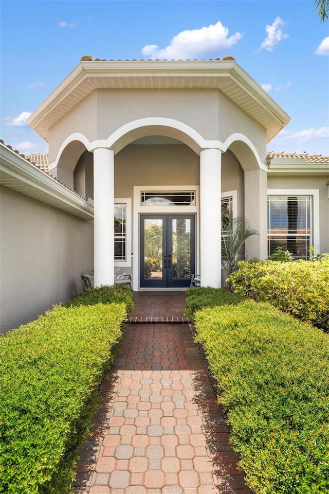 8840 Brookfield Ter, Bradenton, FL 34212 - entrance to property with french doors and stucco siding