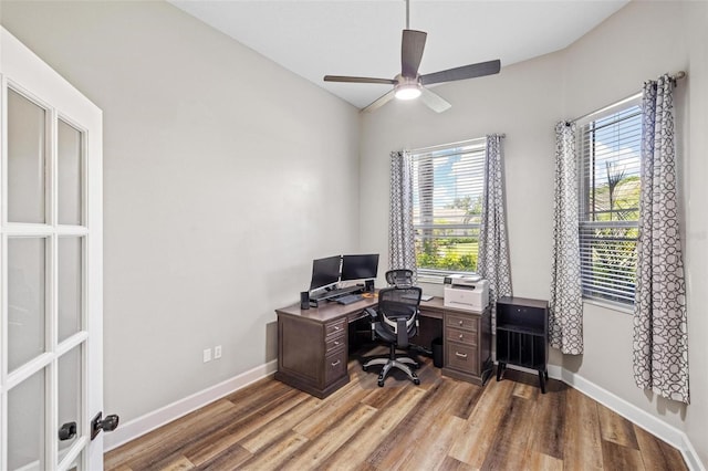 8840 Brookfield Ter, Bradenton, FL 34212 - home office with plenty of natural light, wood finished floors, vaulted ceiling, and ceiling fan