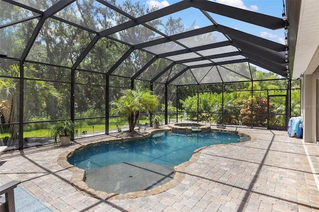 8840 Brookfield Ter, Bradenton, FL 34212 - view of swimming pool with a patio area, a pool with connected hot tub, and a lanai