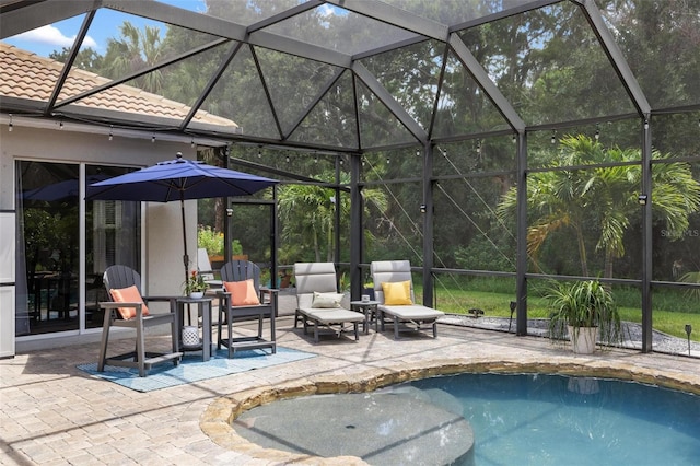 8840 Brookfield Ter, Bradenton, FL 34212 - outdoor pool featuring a patio and glass enclosure