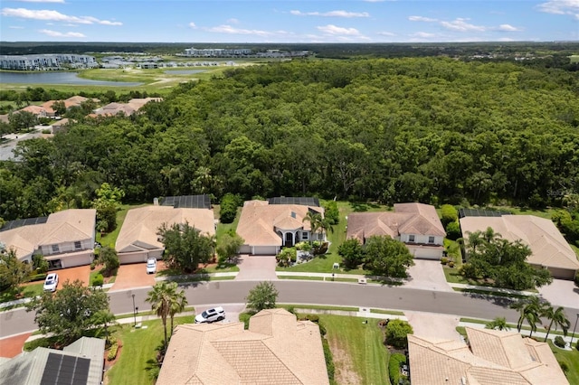 8840 Brookfield Ter, Bradenton, FL 34212 - aerial view of residential area featuring a nearby body of water and a forest