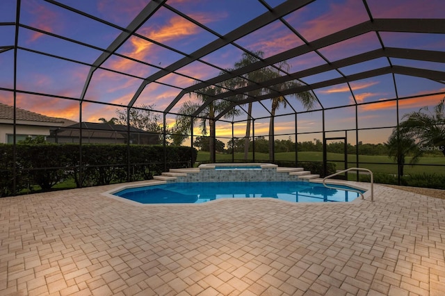 7144 Ashland Gln, Lakewood Ranch, FL 34202 - view of swimming pool featuring a patio, a pool with connected hot tub, and a lanai