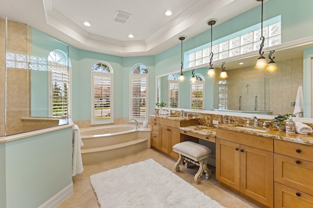 7144 Ashland Gln, Lakewood Ranch, FL 34202 - full bathroom featuring plenty of natural light, crown molding, a bath, vanity, and tile patterned flooring
