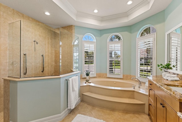 7144 Ashland Gln, Lakewood Ranch, FL 34202 - full bath featuring a bath, vanity, ornamental molding, a walk in shower, and a tray ceiling