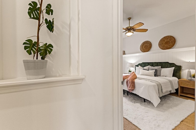 7144 Ashland Gln, Lakewood Ranch, FL 34202 - bedroom featuring a wainscoted wall and a ceiling fan