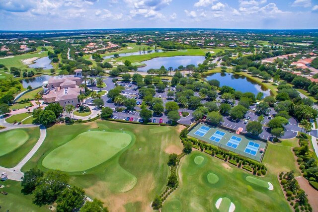 7144 Ashland Gln, Lakewood Ranch, FL 34202 - aerial view of property's location with a large body of water, a golf club, and nearby suburban area