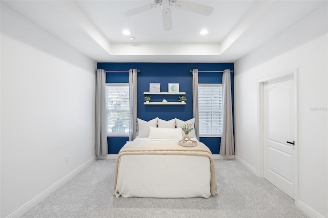 12261 Stuart Dr, Venice, FL 34293 - bedroom with a raised ceiling, carpet flooring, ceiling fan, and recessed lighting