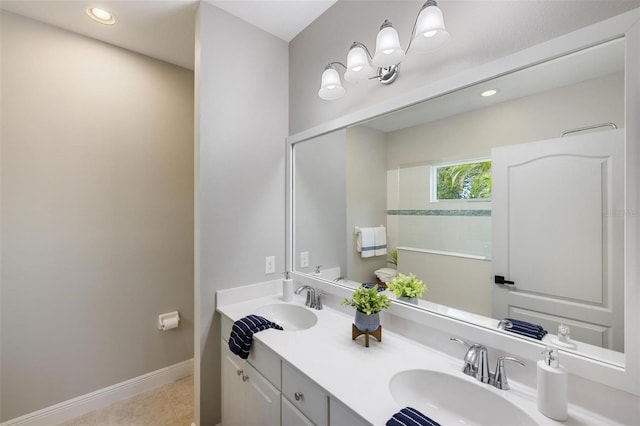 12261 Stuart Dr, Venice, FL 34293 - full bathroom featuring double vanity, tile patterned flooring, and recessed lighting