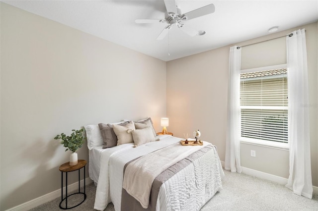 12261 Stuart Dr, Venice, FL 34293 - bedroom with light carpet and a ceiling fan