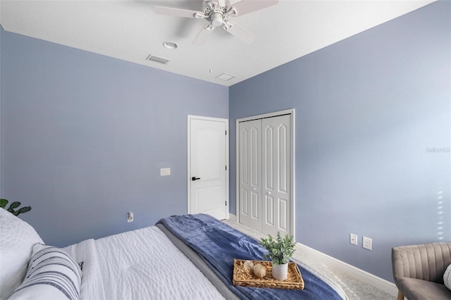 12261 Stuart Dr, Venice, FL 34293 - bedroom with a closet, ceiling fan, and carpet floors
