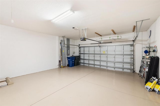 12261 Stuart Dr, Venice, FL 34293 - garage featuring a garage door opener