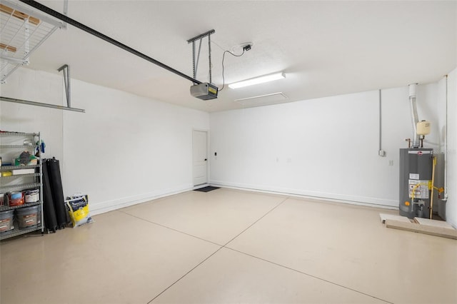12261 Stuart Dr, Venice, FL 34293 - garage with water heater and a garage door opener