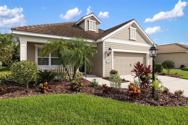 12261 Stuart Dr, Venice, FL 34293 - ranch-style house featuring driveway, an attached garage, a front yard, and a porch