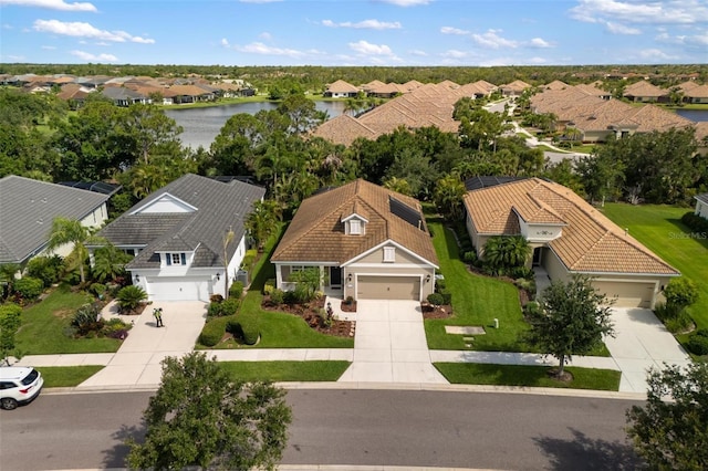 12261 Stuart Dr, Venice, FL 34293 - aerial view of residential area featuring a nearby body of water
