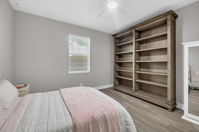 8209 Redonda Loop, Lakewood Ranch, FL 34202 - bedroom featuring wood finished floors and a ceiling fan