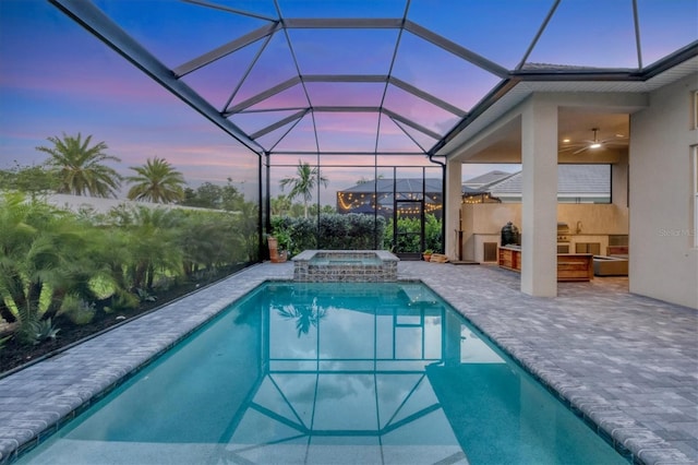 8209 Redonda Loop, Lakewood Ranch, FL 34202 - view of pool featuring a patio area, ceiling fan, glass enclosure, area for grilling, and a pool with connected hot tub