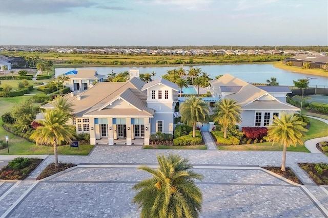 8209 Redonda Loop, Lakewood Ranch, FL 34202 - view of front of property featuring french doors, a water view, and a residential view