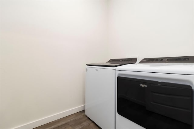 17209 Barnwood Pl, Bradenton, FL 34211 - laundry area with washer and clothes dryer and wood finished floors