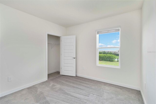 17209 Barnwood Pl, Bradenton, FL 34211 - unfurnished bedroom featuring carpet floors and a closet